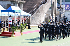 The parade march past the review stand.